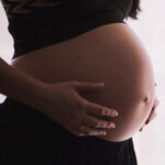 Visuel du cas client Envie de Fraise représentant un ventre de femme enceinte